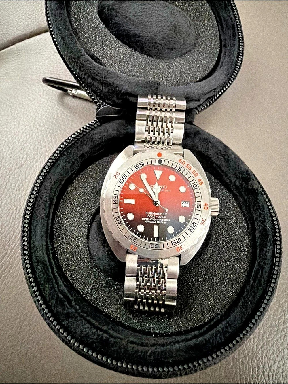 Seiko Men's orange two tone Dial Watch with Silver-Tone Bracelet